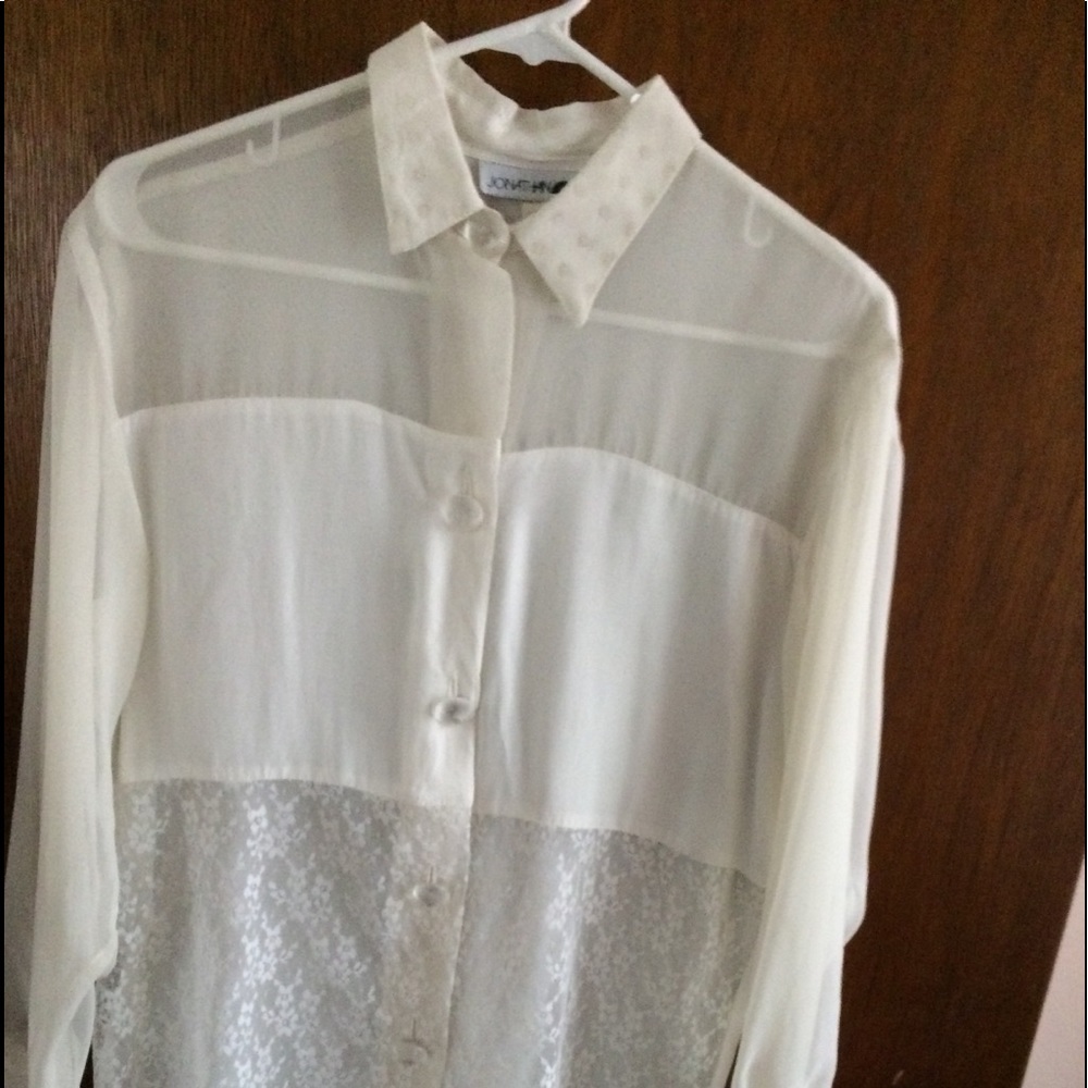 Off White to a very light cream button down blouse